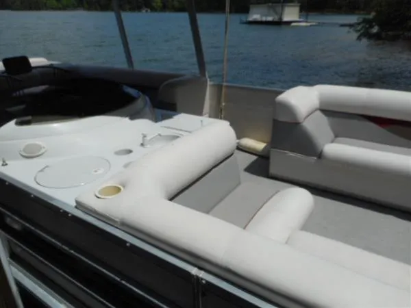 Slide: The Image of 2002 Harris-Kayot Royal Heritage 260 pontoon boat interior with white seating. - 5