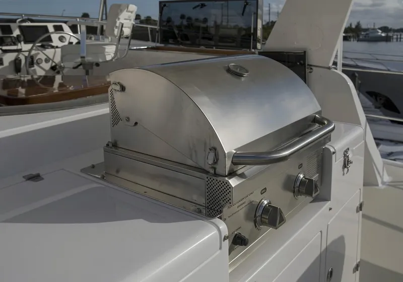 Slide: The Image of Stainless steel grill on the deck of a 2025 Krogen 50 Open yacht. - 16