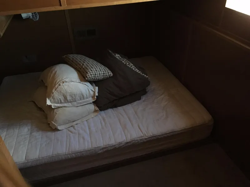 Slide: The Image of Cozy cabin bed with pillows and blankets in Bravada Imagination Trip #15, 2014 model. - 14