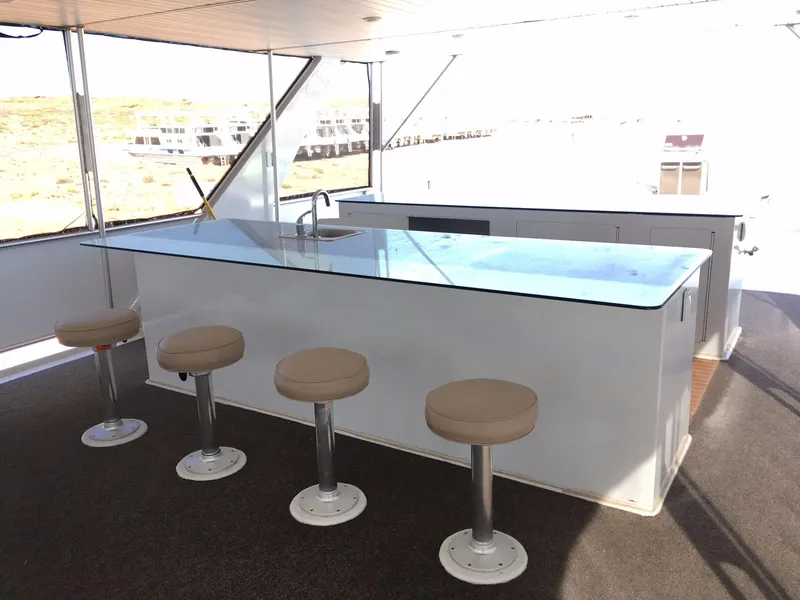Slide: The Image of Luxurious Bravada Imagination Trip #15 yacht bar area with stools, 2014 model. - 29