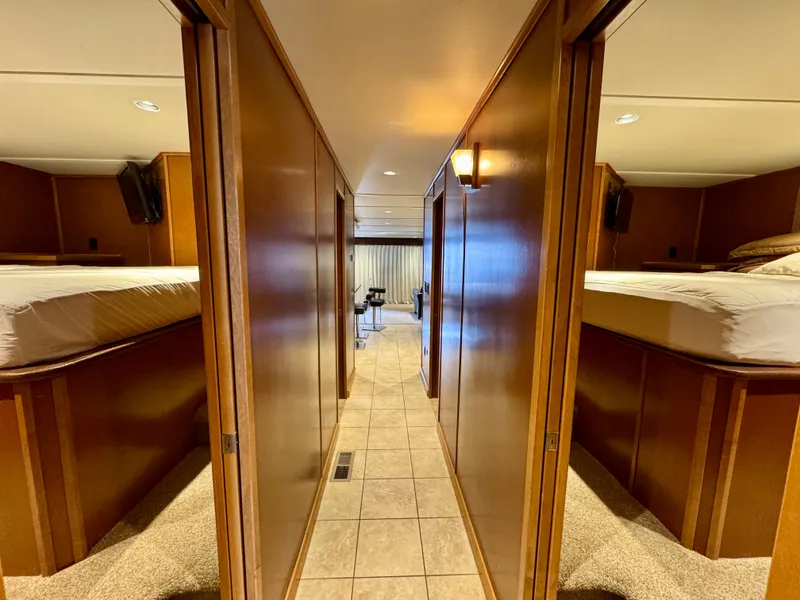 Slide: The Image of Carpeted stairs in a 2012 Bravada Helios Share #8, featuring wooden walls. - 13