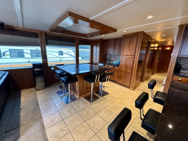 Slide: The Image of Luxurious Bravada Helios Share #8 interior with waterfront view, featuring entertainment center, 2012 model. - 15