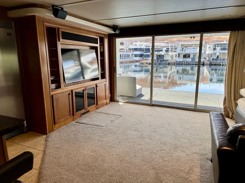 Slide: The Image of Luxurious 2012 Bravada Helios Share #8 houseboat interior with bar and seating area. - 19