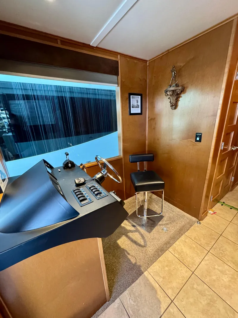 Slide: The Image of Hallway in 2012 Bravada Helios Share #8 with wooden paneling and tiled floor. - 2
