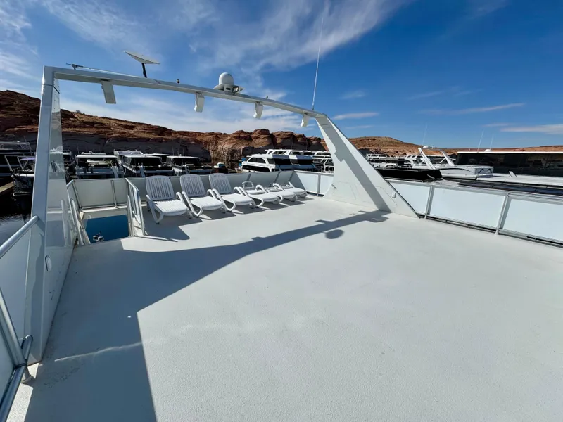 Slide: The Image of Houseboat deck view, Bravada Helios Share #8, 2012, docked on calm water. - 24