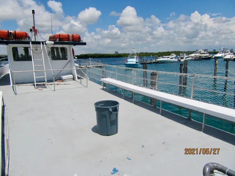 Slide: The Image of Commercial drift fishing boat docked at marina, clear skies, 1986 model. - 15