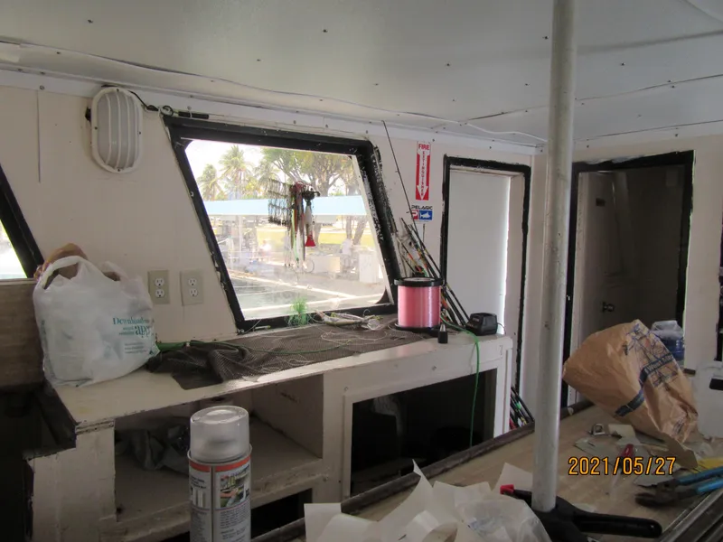 Slide: The Image of Interior of 1986 commercial drift fishing boat with equipment and supplies. - 36