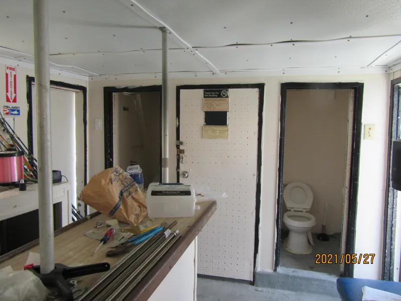 Slide: The Image of Interior of 1986 Drift Fishing Party boat with restroom and equipment. - 41