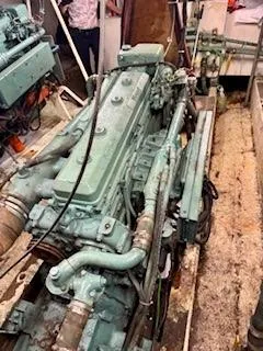 Slide: The Image of Engine room of 1986 Commercial Drift Fishing Party boat, showcasing machinery and components. - 43