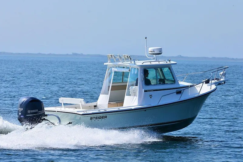 The Image of 2024 Steiger Craft 23 Miami boat cruising on open water. - 0