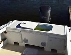 Slide: The Image of 2024 Steiger Craft 255DV Long Beach CC boat stern with outboard motor. - 3