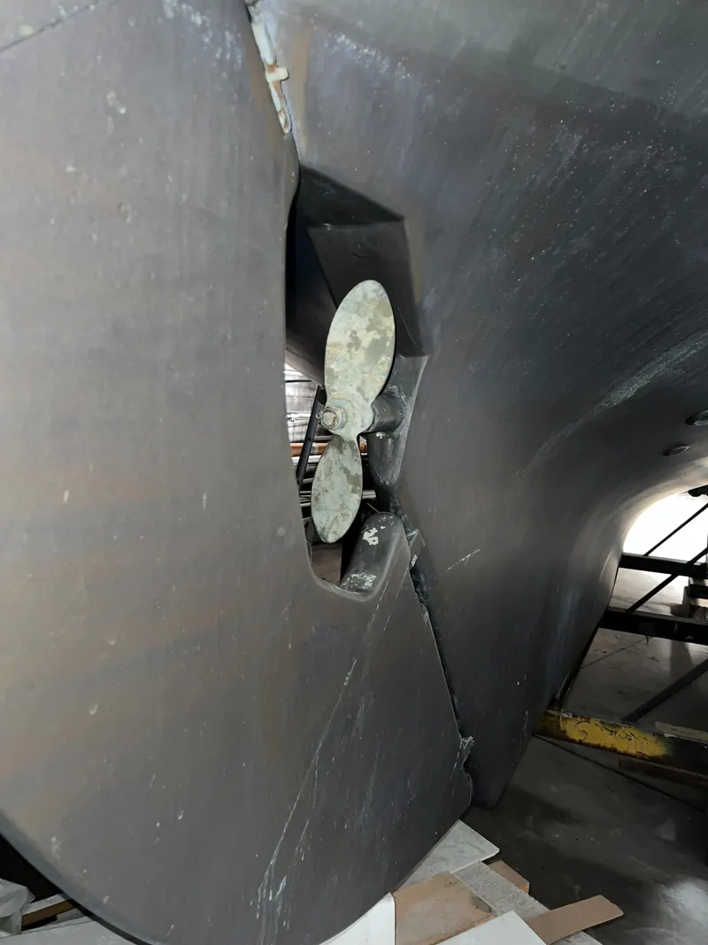 Slide: The Image of Propeller of a 1965 Allied Marine Sea Wind 30 sailboat in dry dock. - 13