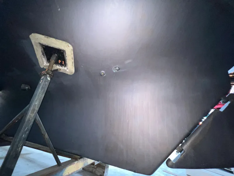 Slide: The Image of Bottom view of 1965 Allied Marine Sea Wind 30 sailboat hull in dry dock. - 16