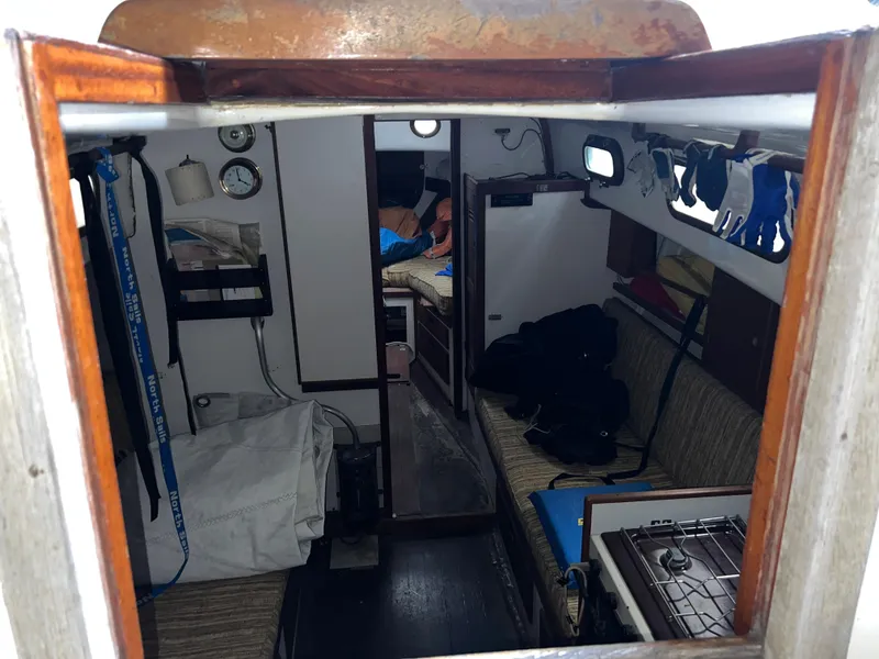 Slide: The Image of Interior of 1965 Allied Marine Sea Wind 30 sailboat with cozy cabin layout. - 4