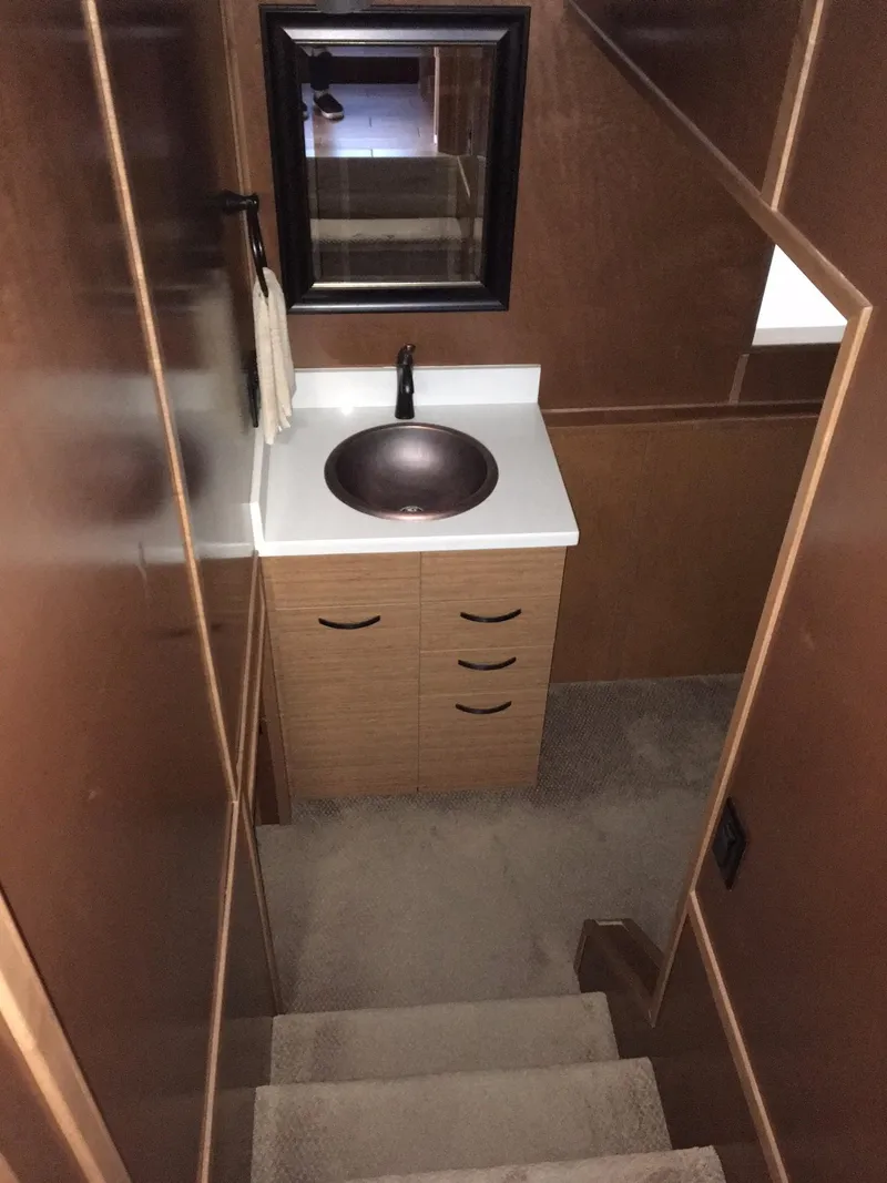 Slide: The Image of Compact bathroom in 2014 Bravada Imagination Share #4, featuring a modern sink and mirror. - 12