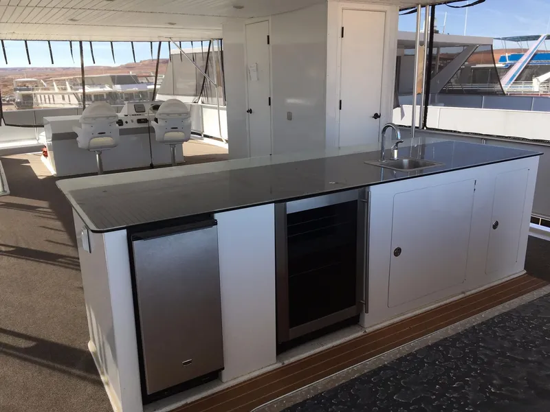 Slide: The Image of Luxurious 2014 Bravada houseboat kitchen with modern appliances and sleek design. - 30