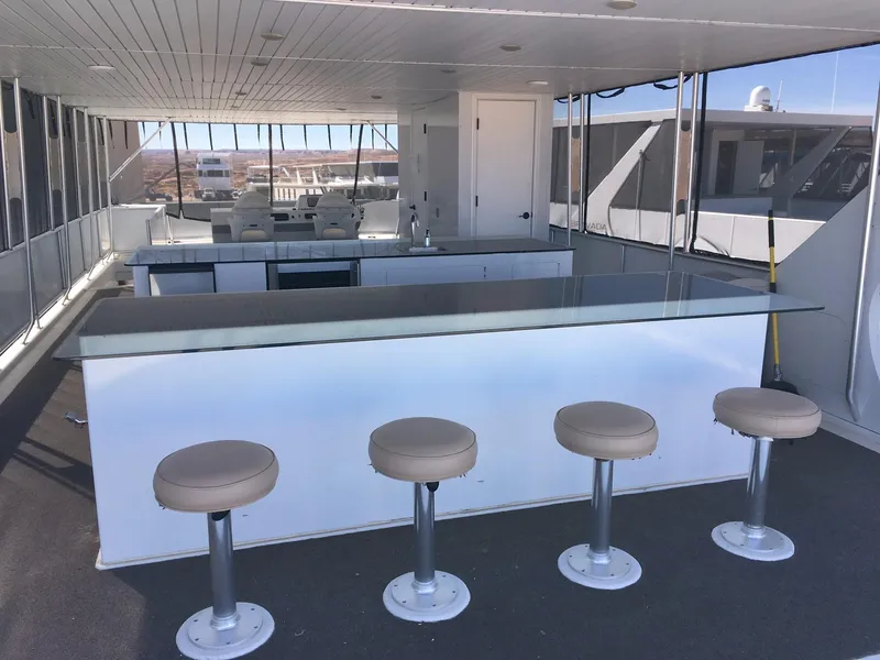 Slide: The Image of Luxurious 2014 Bravada Imagination Share #4 yacht with sleek bar and seating area. - 32