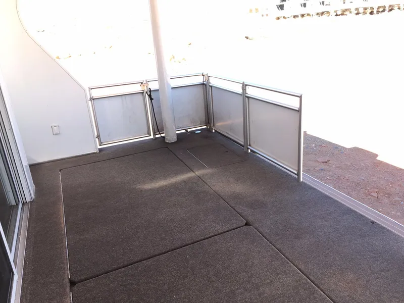 Slide: The Image of Carpeted deck area on a 2014 Bravada Imagination Share #4 houseboat. - 5