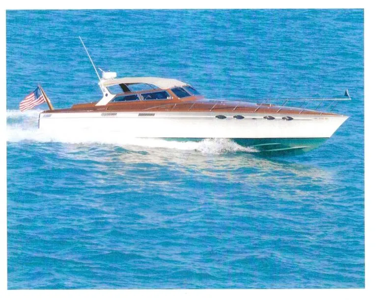 The Image of Mays Craft 44 yacht from 1990 cruising on clear blue water. - 0