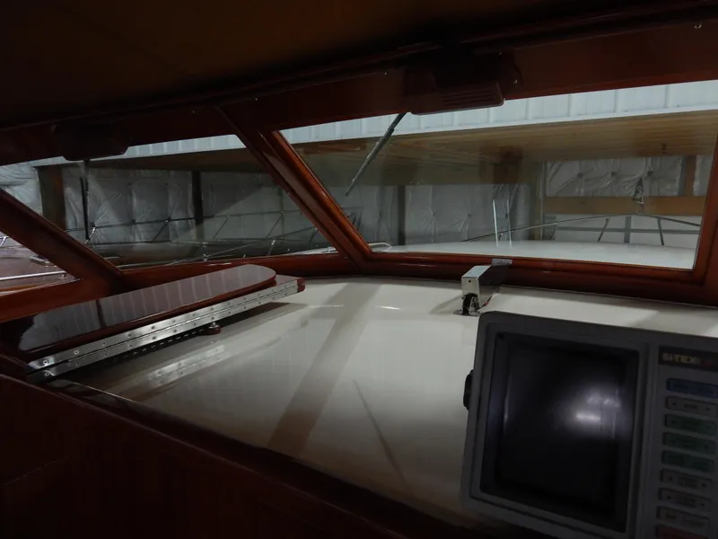 Slide: The Image of Interior view of a 1990 Mays Craft 44 boat with navigation equipment. - 17