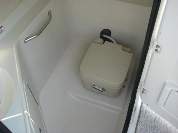 Slide: The Image of Interior of 2008 Sea Ray 260 Sundeck with portable toilet. - 12