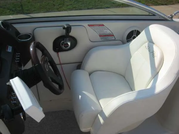 Slide: The Image of Interior of a 2008 Sea Ray 260 Sundeck with white seating. - 14