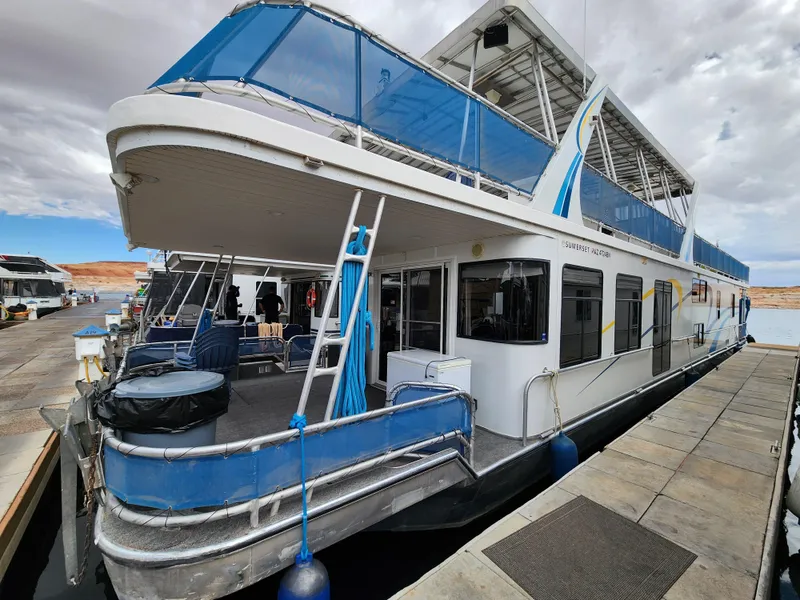 Slide: The Image of Houseboat docked at marina, Sumerset Blue Moon Share #12, 2008 model, with blue accents. - 11