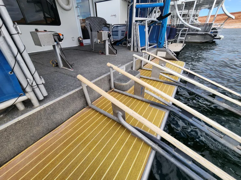 Slide: The Image of 2008 Sumerset Blue Moon Share #12 houseboat with wooden ramps and water access. - 20