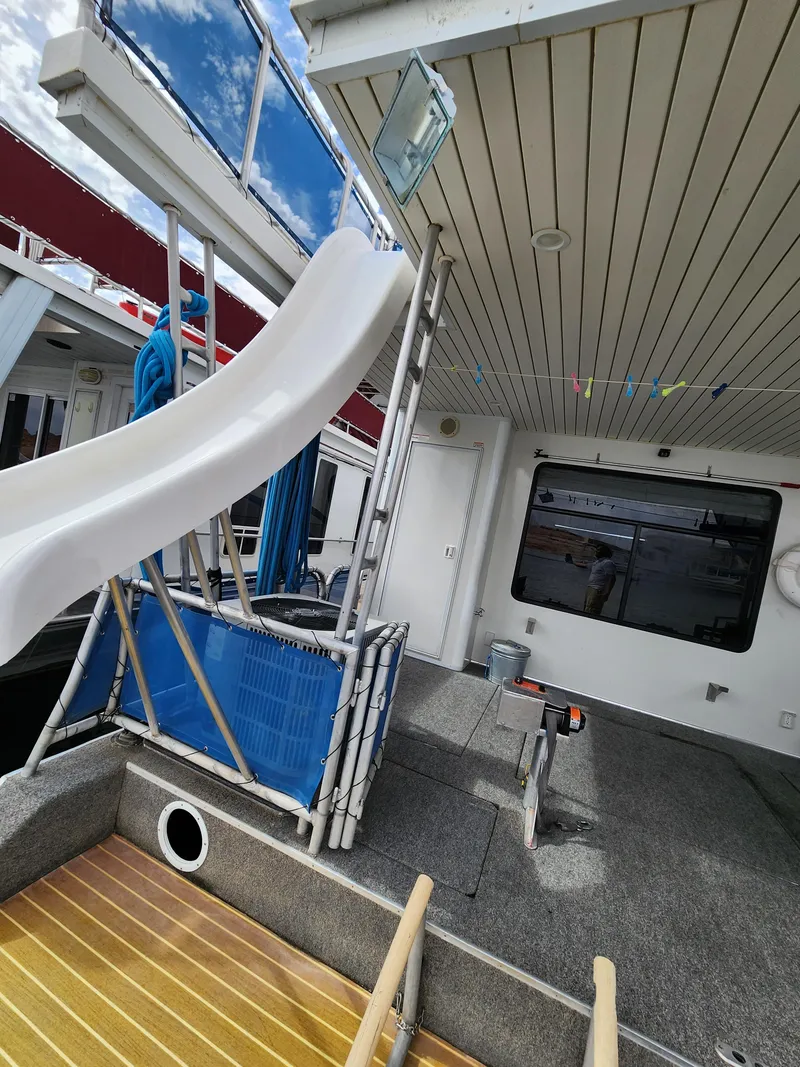 Slide: The Image of 2008 Sumerset Blue Moon Share #12 houseboat with slide and upper deck view. - 22
