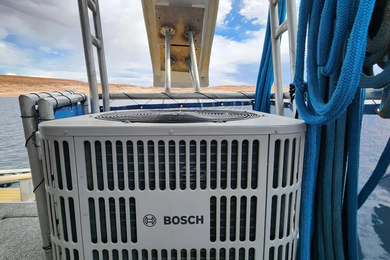 Slide: The Image of Bosch air conditioning unit on 2008 Sumerset Blue Moon Share #12 houseboat deck. - 26