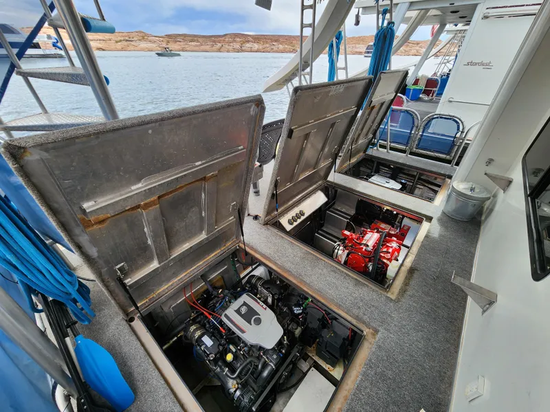 Slide: The Image of Engine compartments open on a 2008 Sumerset Blue Moon Share #12 houseboat. - 29