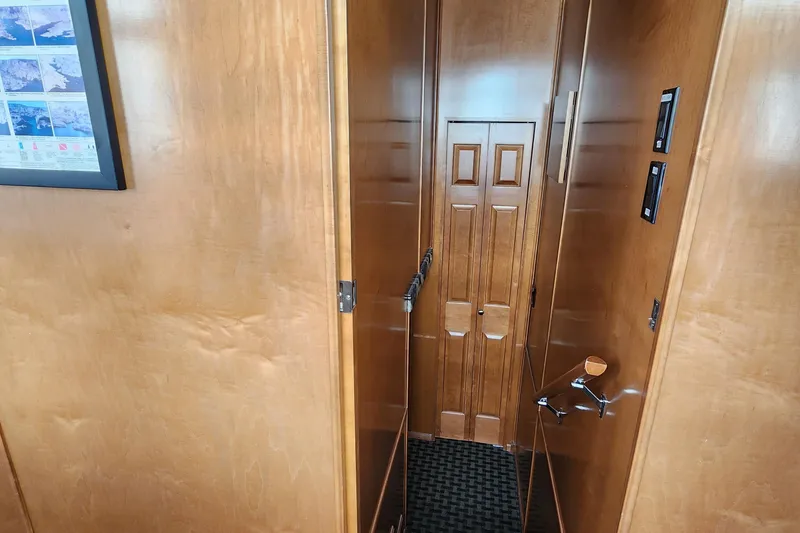 Slide: The Image of Wood-paneled hallway in 2008 Sumerset Blue Moon Share #12 houseboat. - 40