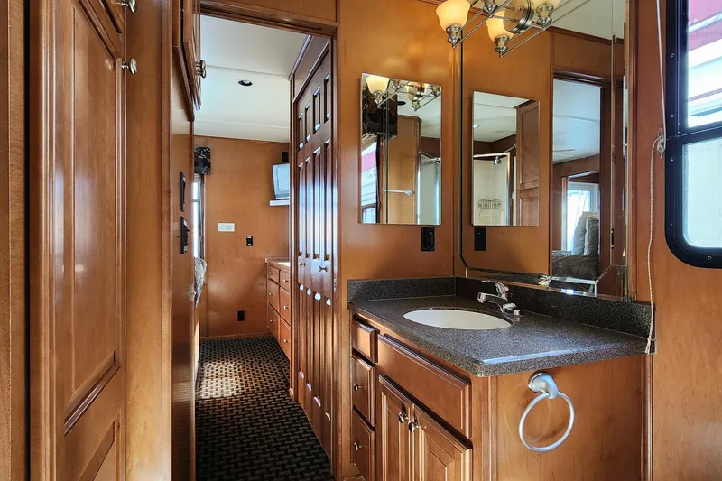 Slide: The Image of Luxurious 2008 Sumerset Blue Moon Share #12 bathroom with wooden cabinetry and modern fixtures. - 43