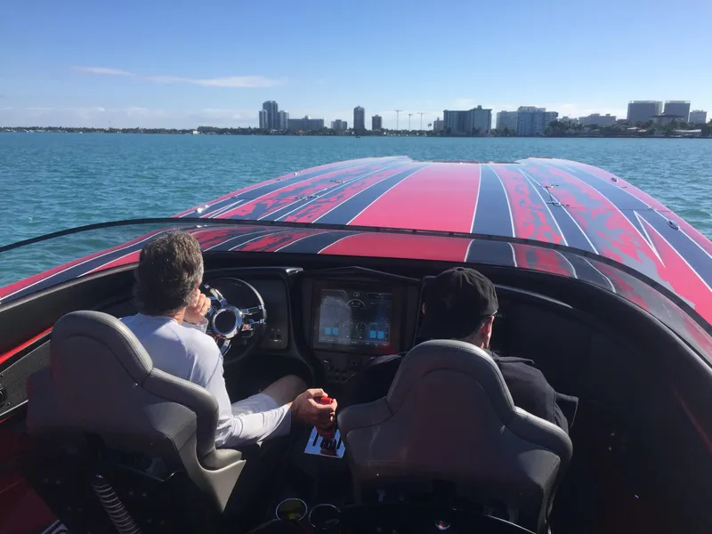 Slide: The Image of 2025 MTI Marine Technology Inc 48 Pleasure boat cruising on open water. - 12