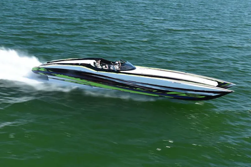 Slide: The Image of 2025 MTI Marine Technology Inc 48 Pleasure speedboat cruising on open water. - 14