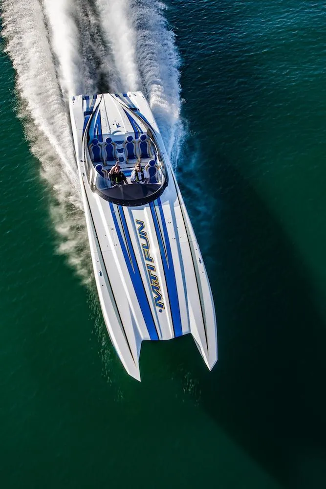 Slide: The Image of 2025 MTI Marine Technology Inc 48 Pleasure speedboat cruising on water. - 15