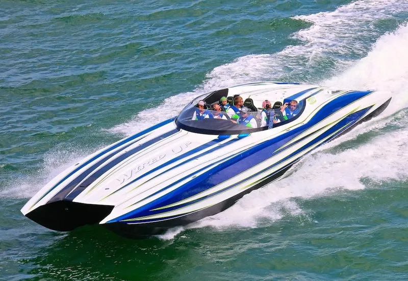 Slide: The Image of 2025 MTI Marine Technology Inc 48 Pleasure speedboat cruising on water. - 16