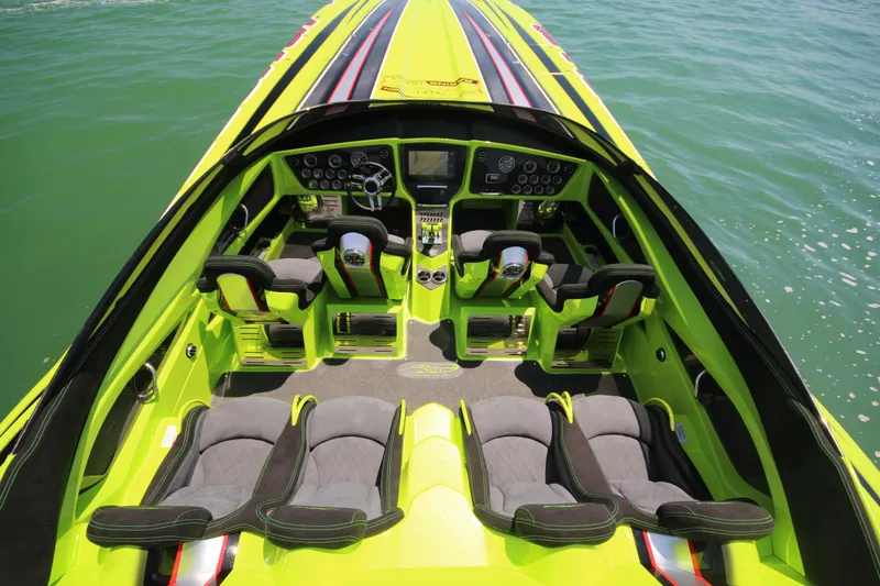 Slide: The Image of 2025 MTI Marine Technology Inc 48 Pleasure boat interior with vibrant green and black seating. - 4