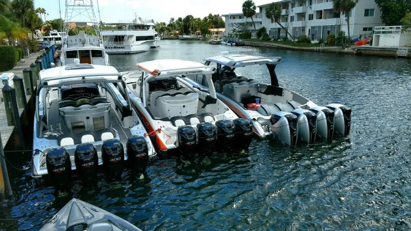 Slide: The Image of Three 2025 MTI V Marine Technology Inc V 57 boats docked in a canal. - 3