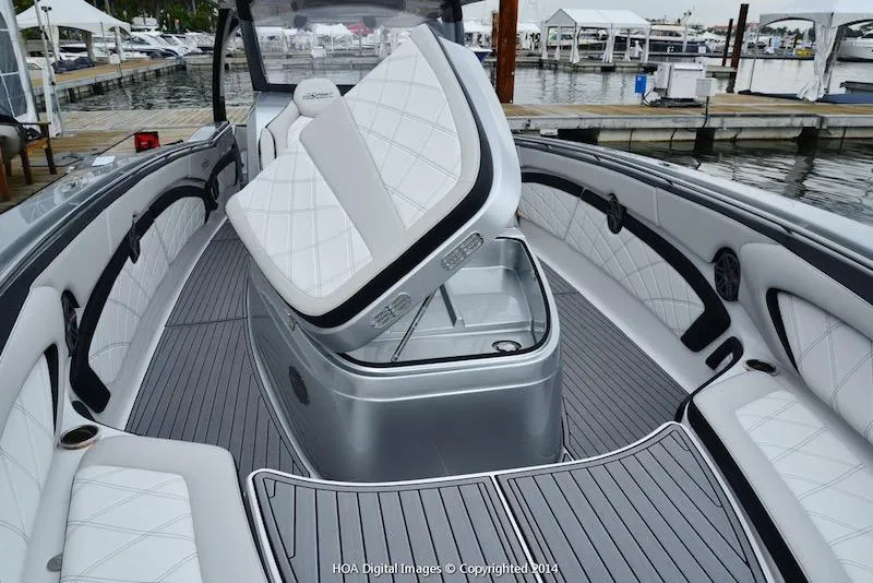 Slide: The Image of 2025 MTI V Marine Technology Inc V 42 boat interior with white seating and gray flooring. - 23