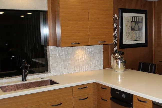 Slide: The Image of Luxurious dining area with wooden table, fruit bowl, and modern stainless steel refrigerator. - 5