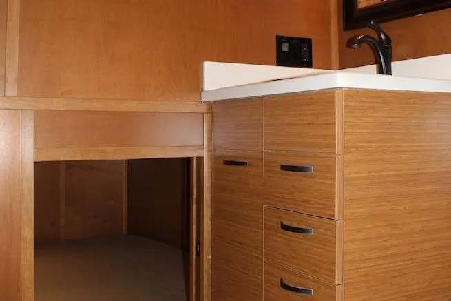 Slide: The Image of Cozy bedroom interior in 2014 Bravada Infinity Trip #8 with framed floral art. - 10