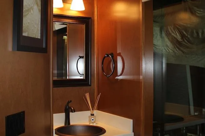 Slide: The Image of Stacked washer and dryer in wooden cabinet, Bravada Infinity Trip #8, 2014 model. - 14