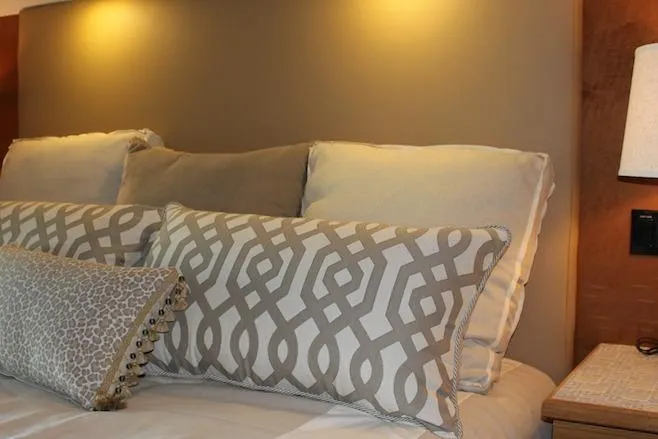 Slide: The Image of Luxurious bed with patterned pillows in Bravada Infinity Trip #8, 2014 model. - 16