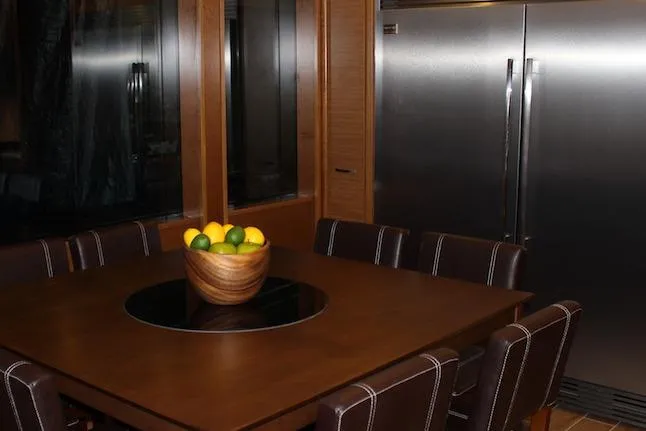 Slide: The Image of Luxurious interior of 2014 Bravada Infinity Trip #8 with modern dining area and kitchen. - 6