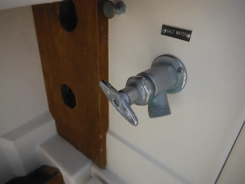 Slide: The Image of Saltwater faucet on a 1985 Blackfin 29 Combi boat. - 12