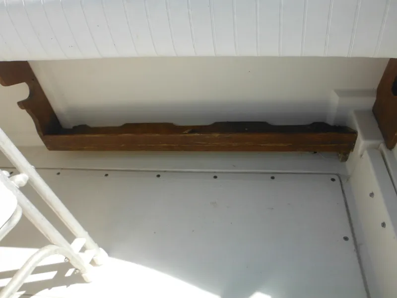 Slide: The Image of 1985 Blackfin 29 Combi boat interior detail with wooden trim. - 13