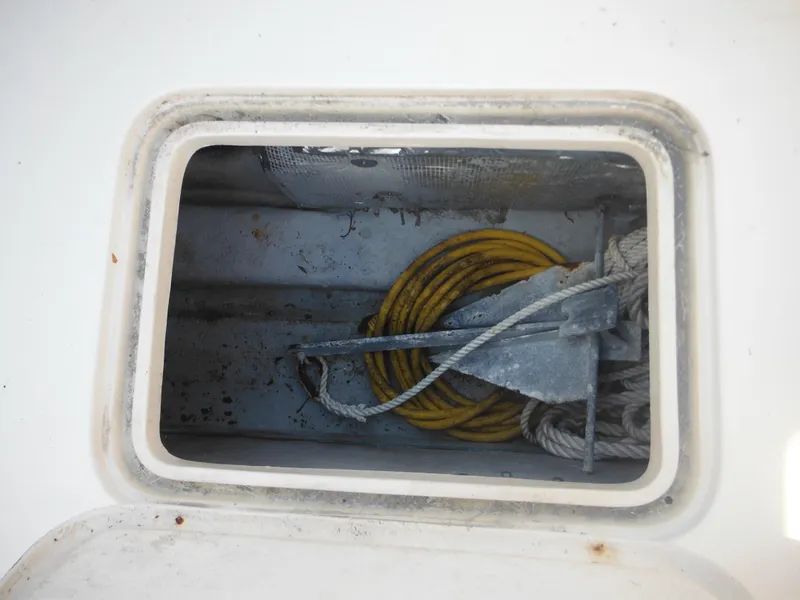 Slide: The Image of Anchor storage compartment on a 1985 Blackfin 29 Combi boat. - 18