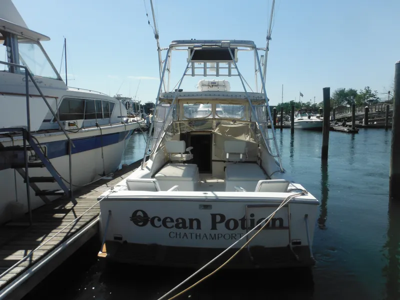 Slide: The Image of 1985 Blackfin 29 Combi boat named Ocean Potion docked at Chathamport. - 2