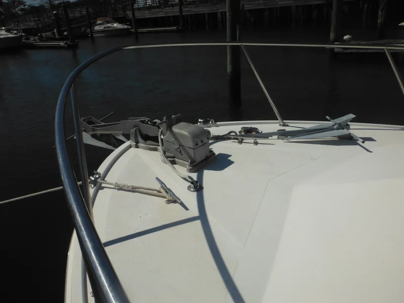 Slide: The Image of 1985 Blackfin 29 Combi boat bow with anchor and railing. - 29
